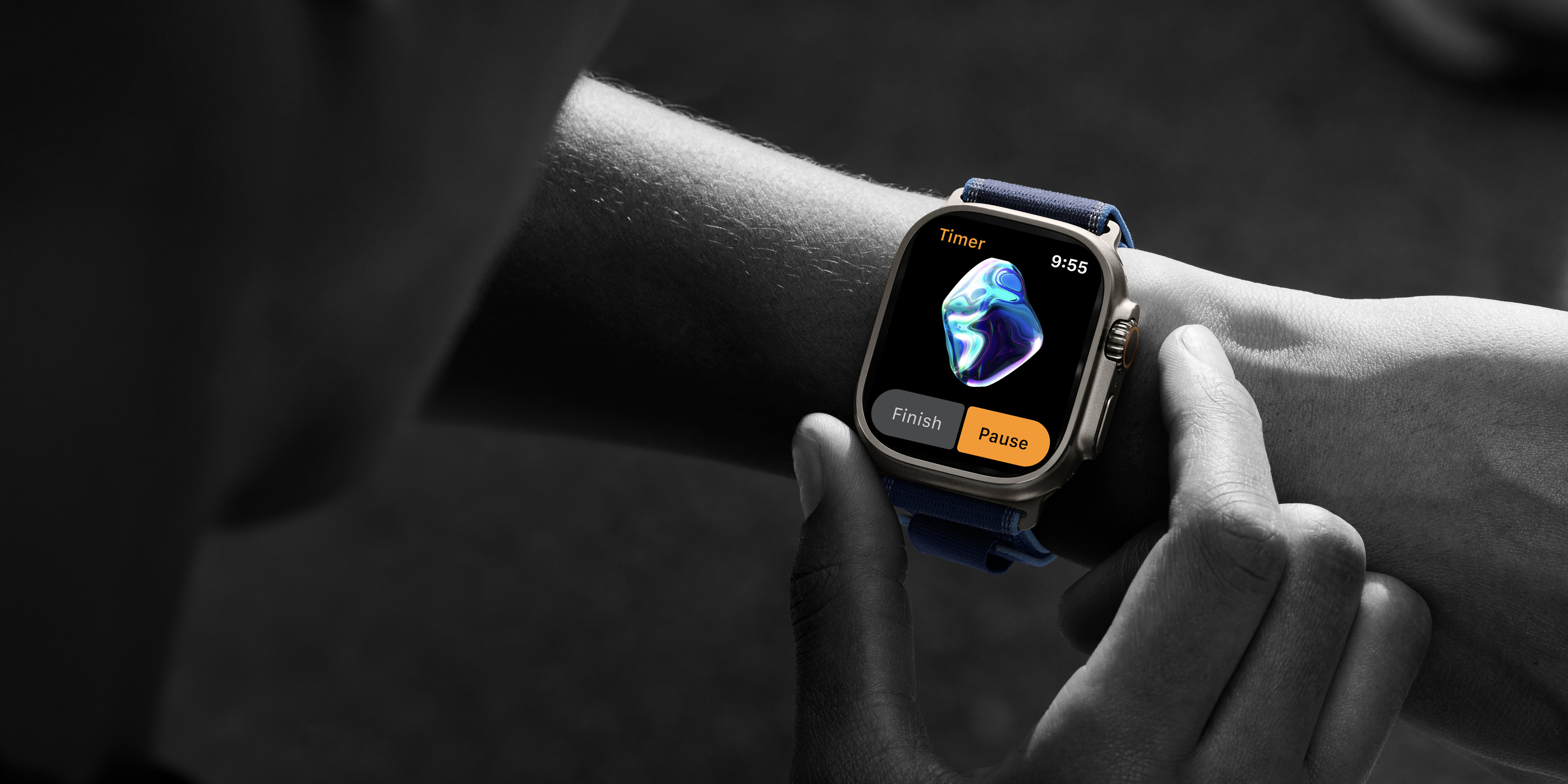Apple Watch Ultra showing the Beloo app with the AI sphere and Pause button